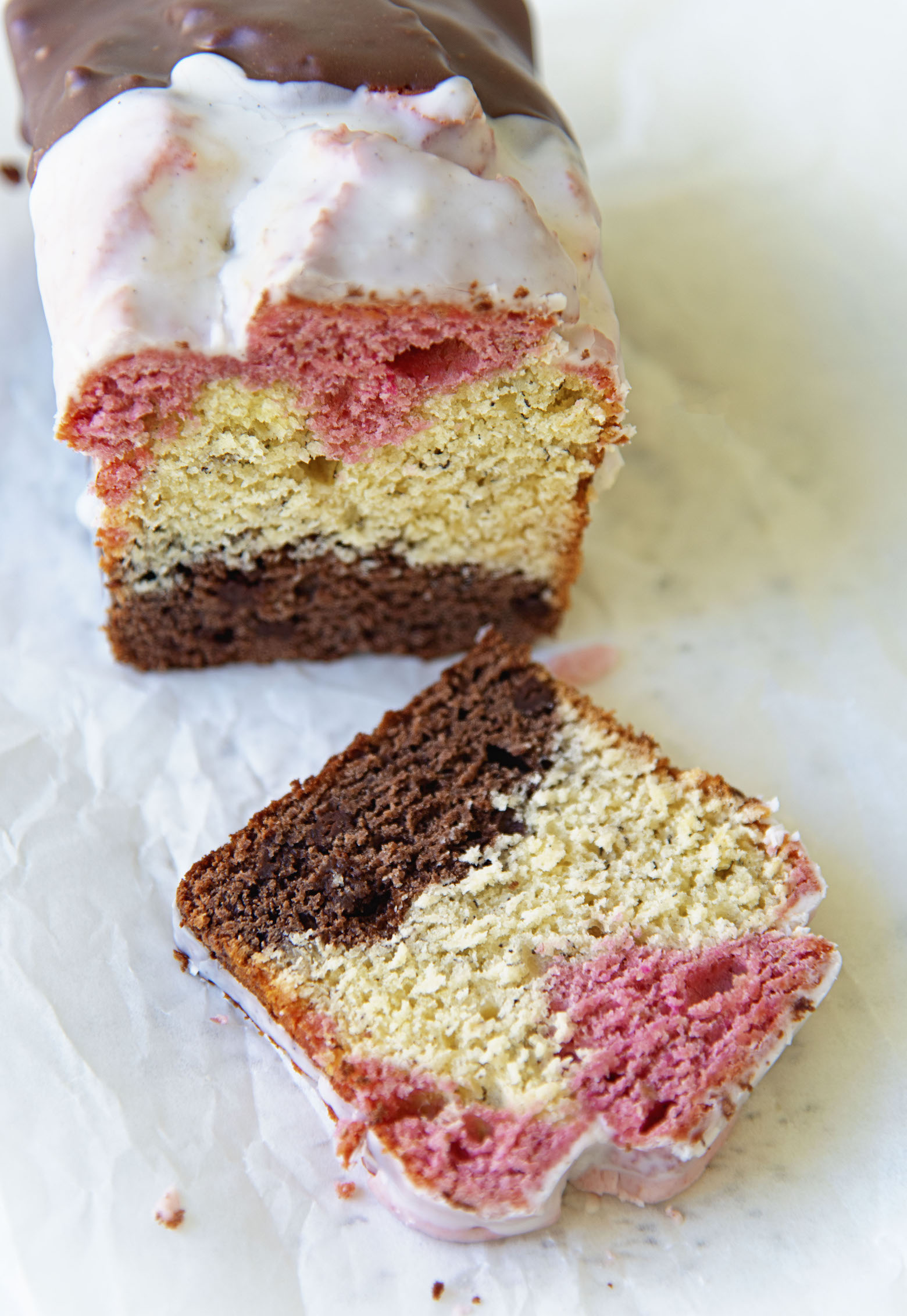 Neapolitan Banana Bread cut with one slice down