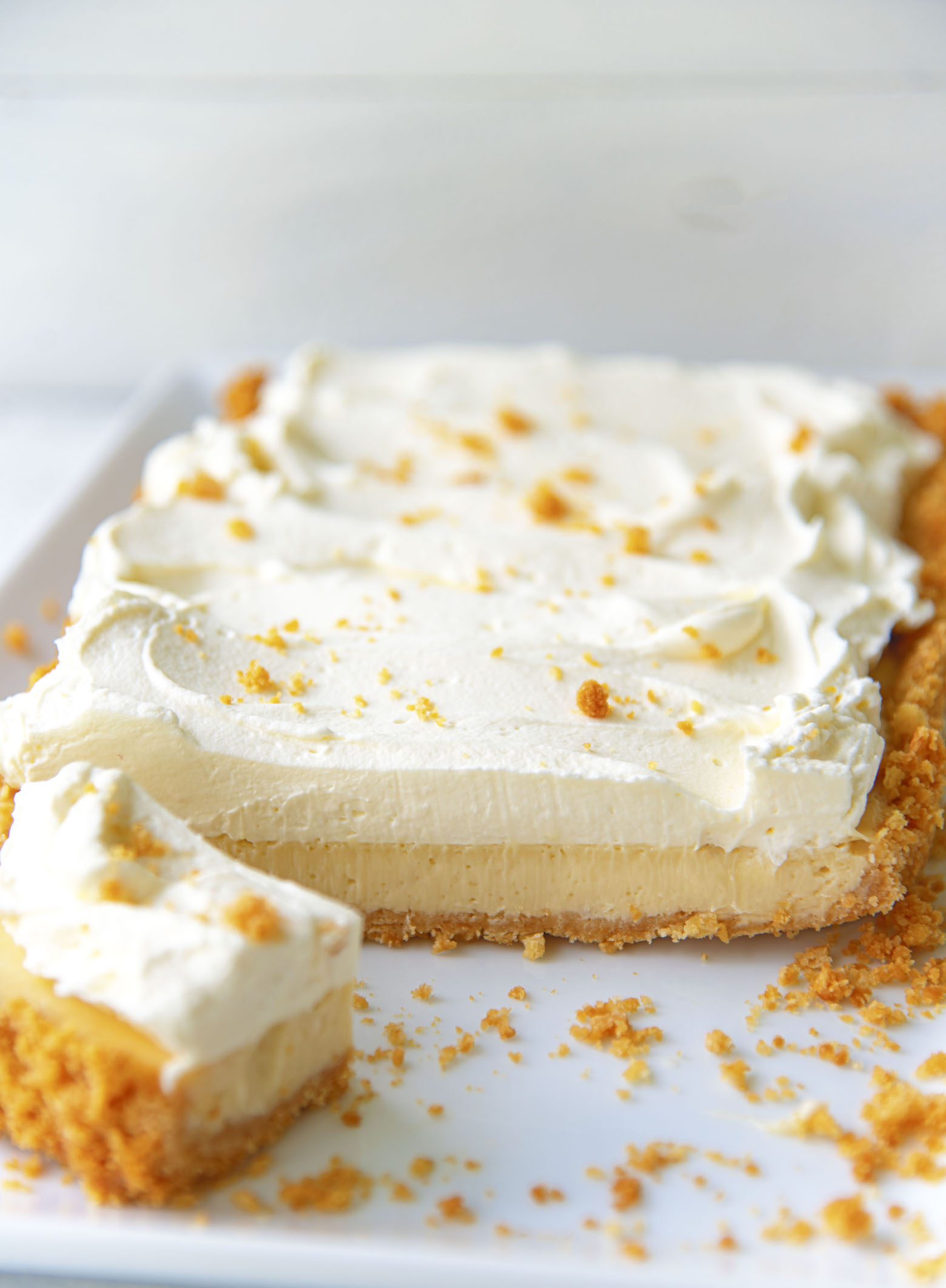 Side view of sliced tart on a platter.