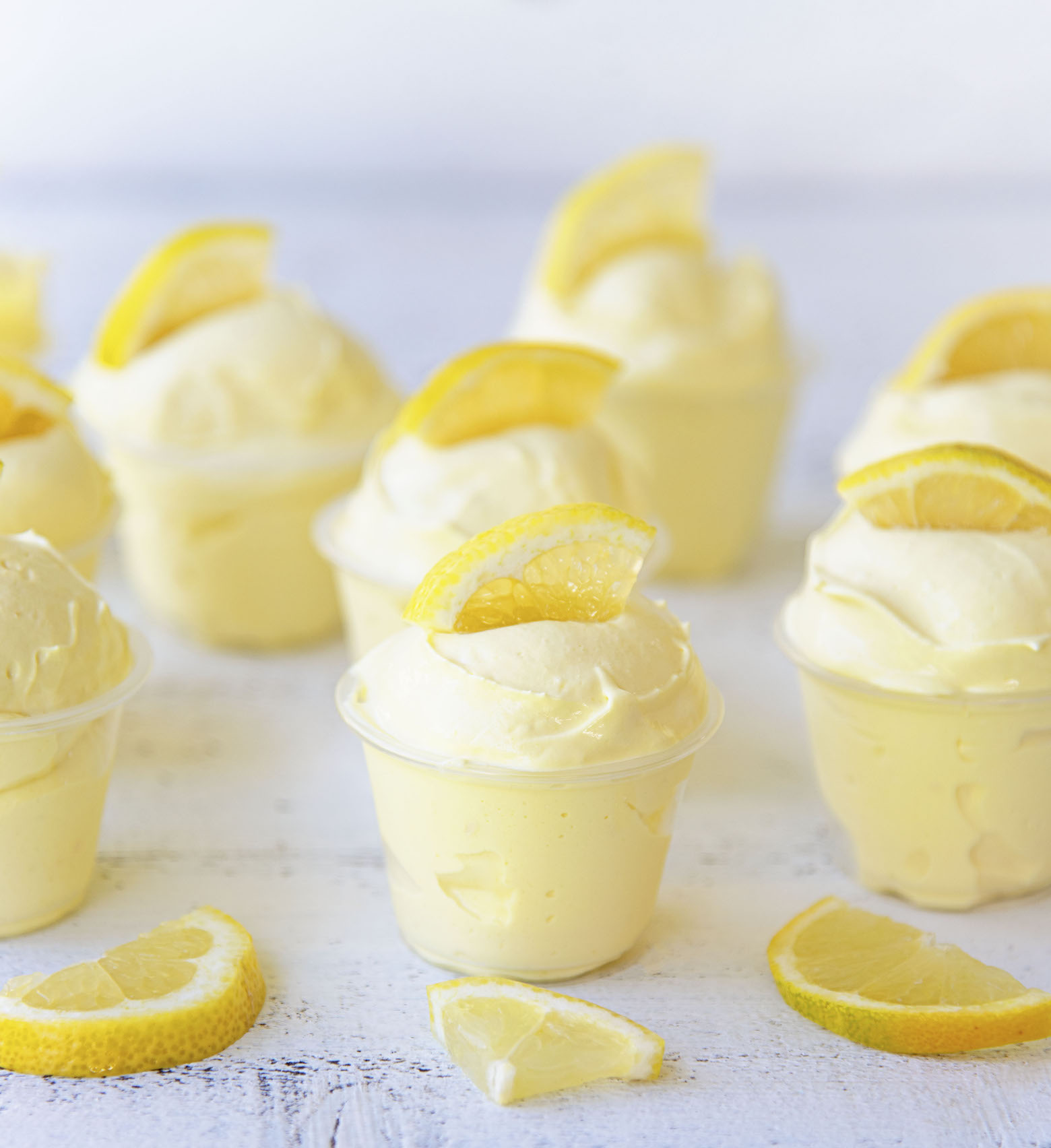 Side view of a gathering of Frosted Lemonade Pudding Shots