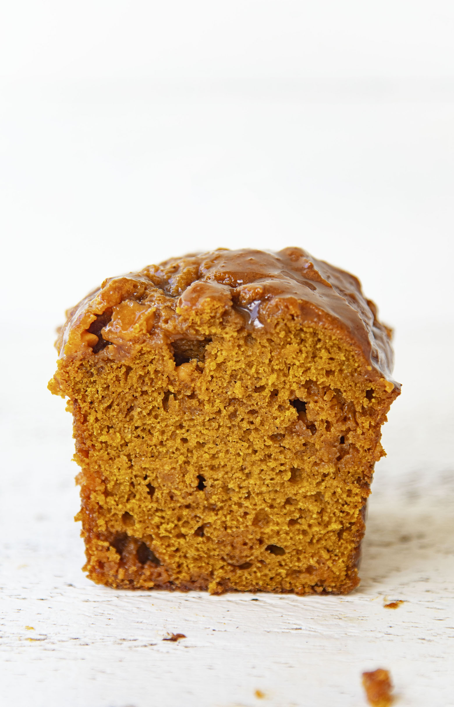 Side view of cut piece of Butterscotch Glazed Pumpkin Bread