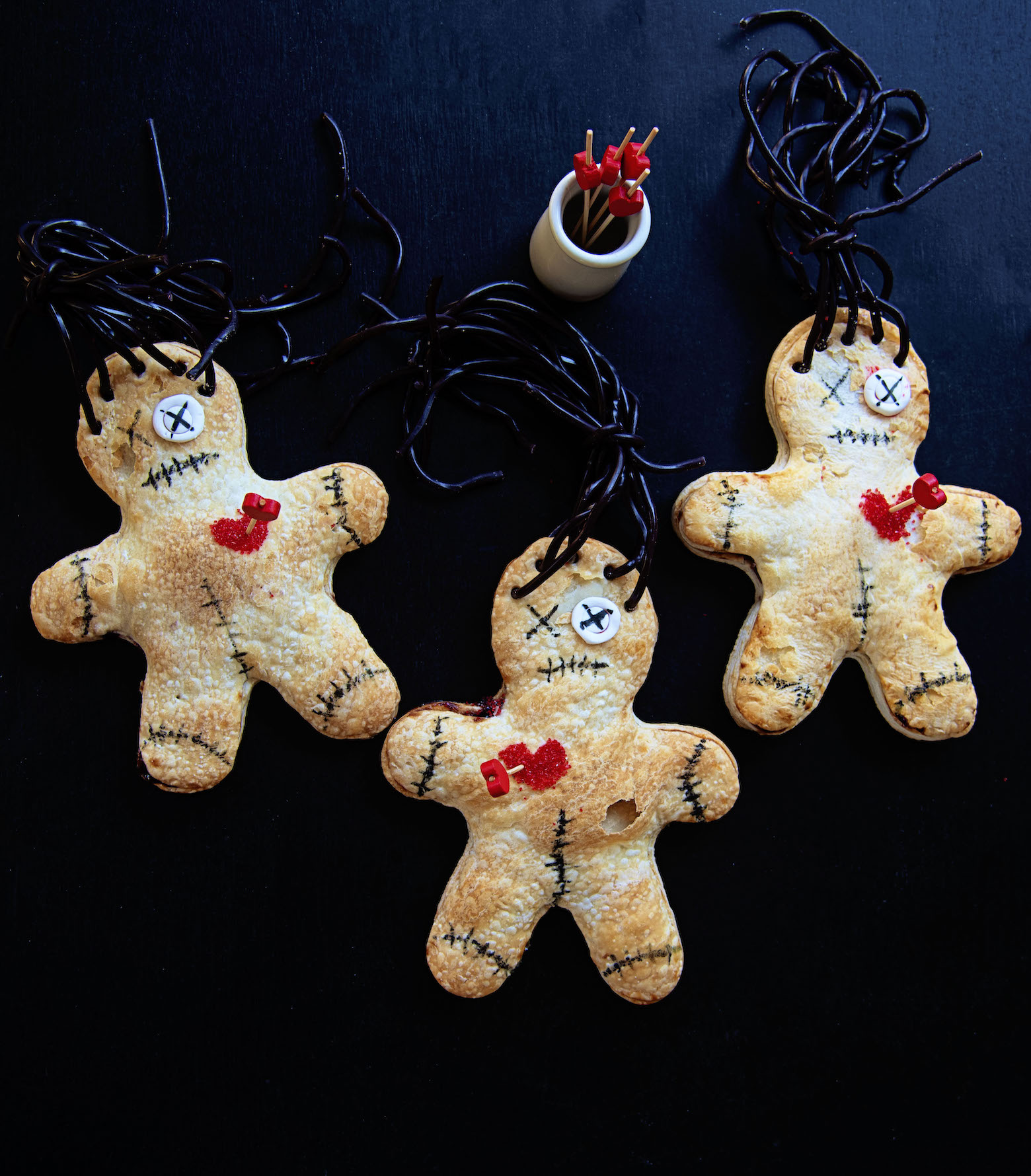 Overhead shot of three Voodoo Doll Hand Pies