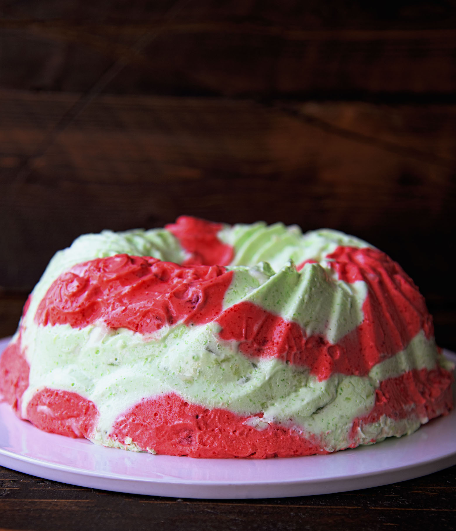 Side view of the jello mold on a plate. 