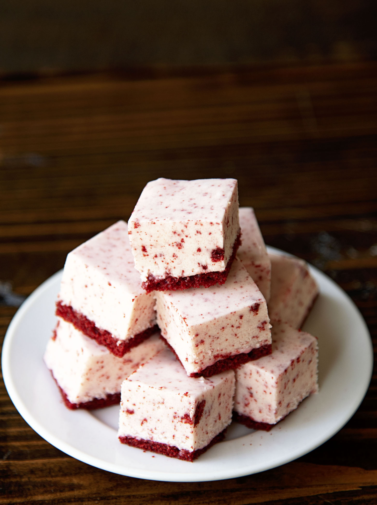 Stack of Cream Cheese Red Velvet Fudge on a plate