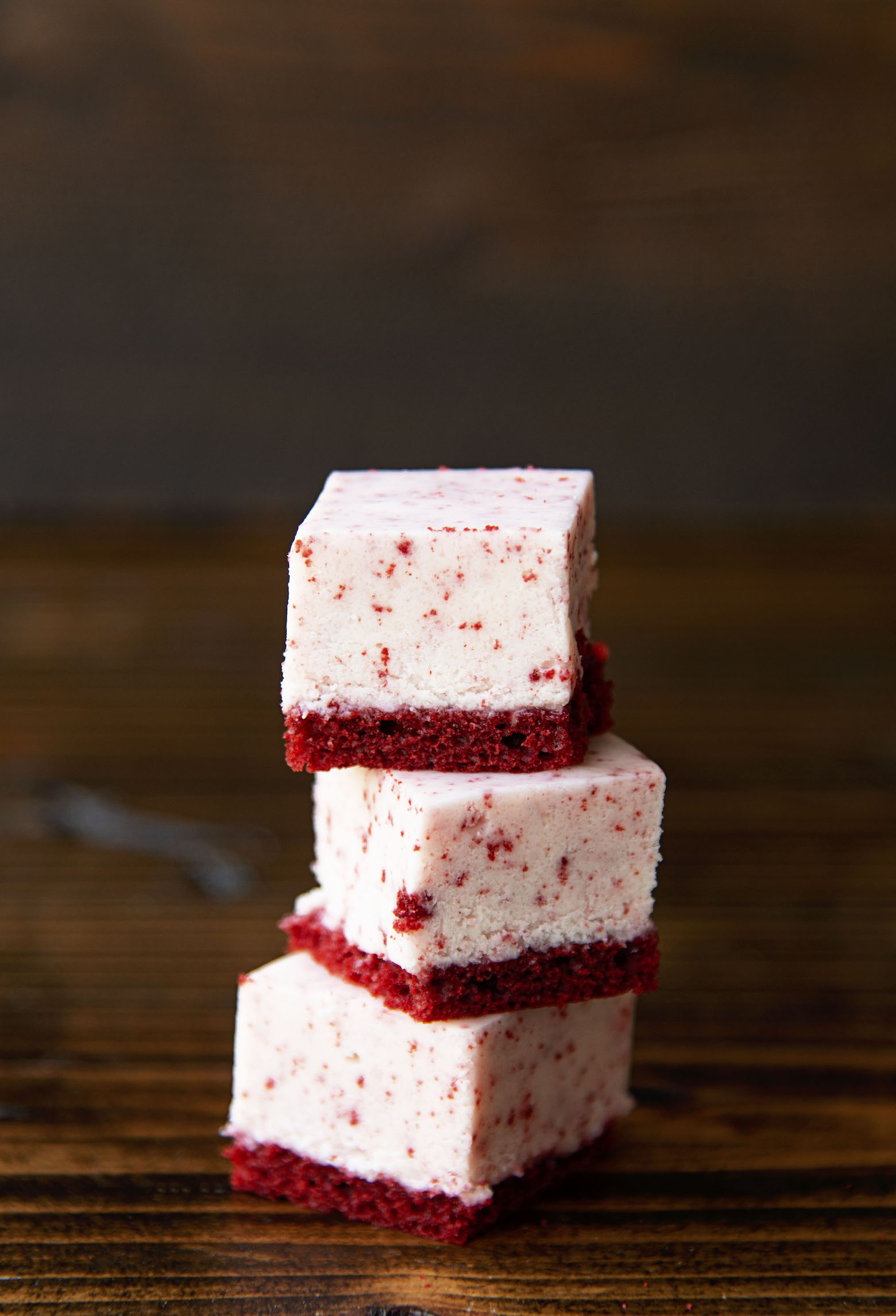 Three pieces of fudge stacked on top of each other.