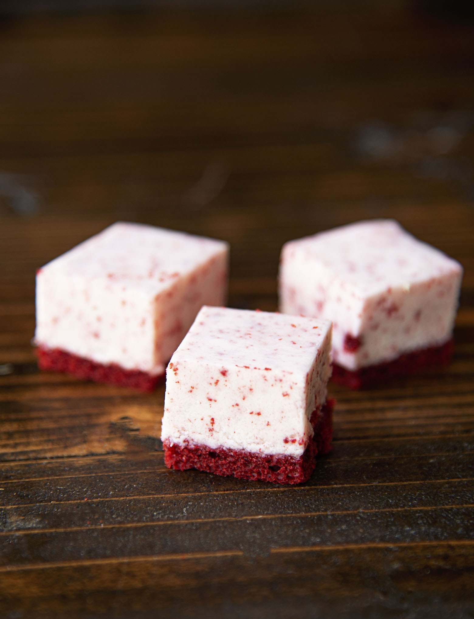 Three pieces of Cream Cheese Red Velvet Fudge