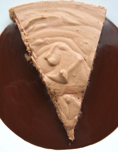 Overhead shot of a slice of Velvet Chocolate Torte in chocolate sauce