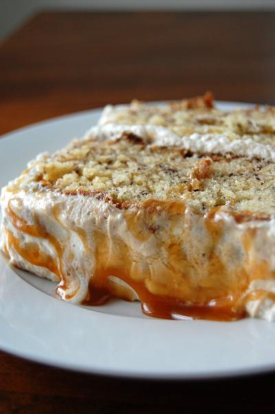 Slice of cake on plate with close up of the caramel on the frosting