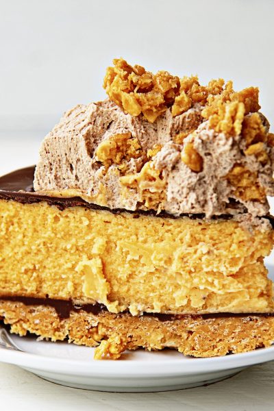 Chocolate Glazed Scotcharoo Cheesecake