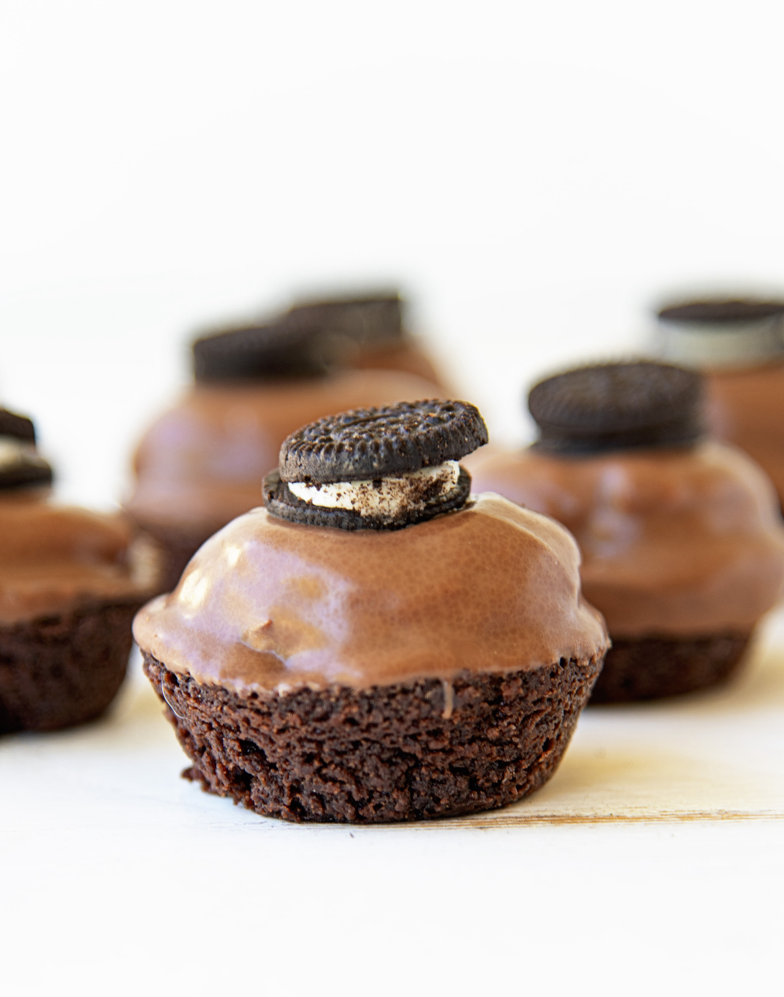 Side view of several whole Double Stuffed Brownie Bites
