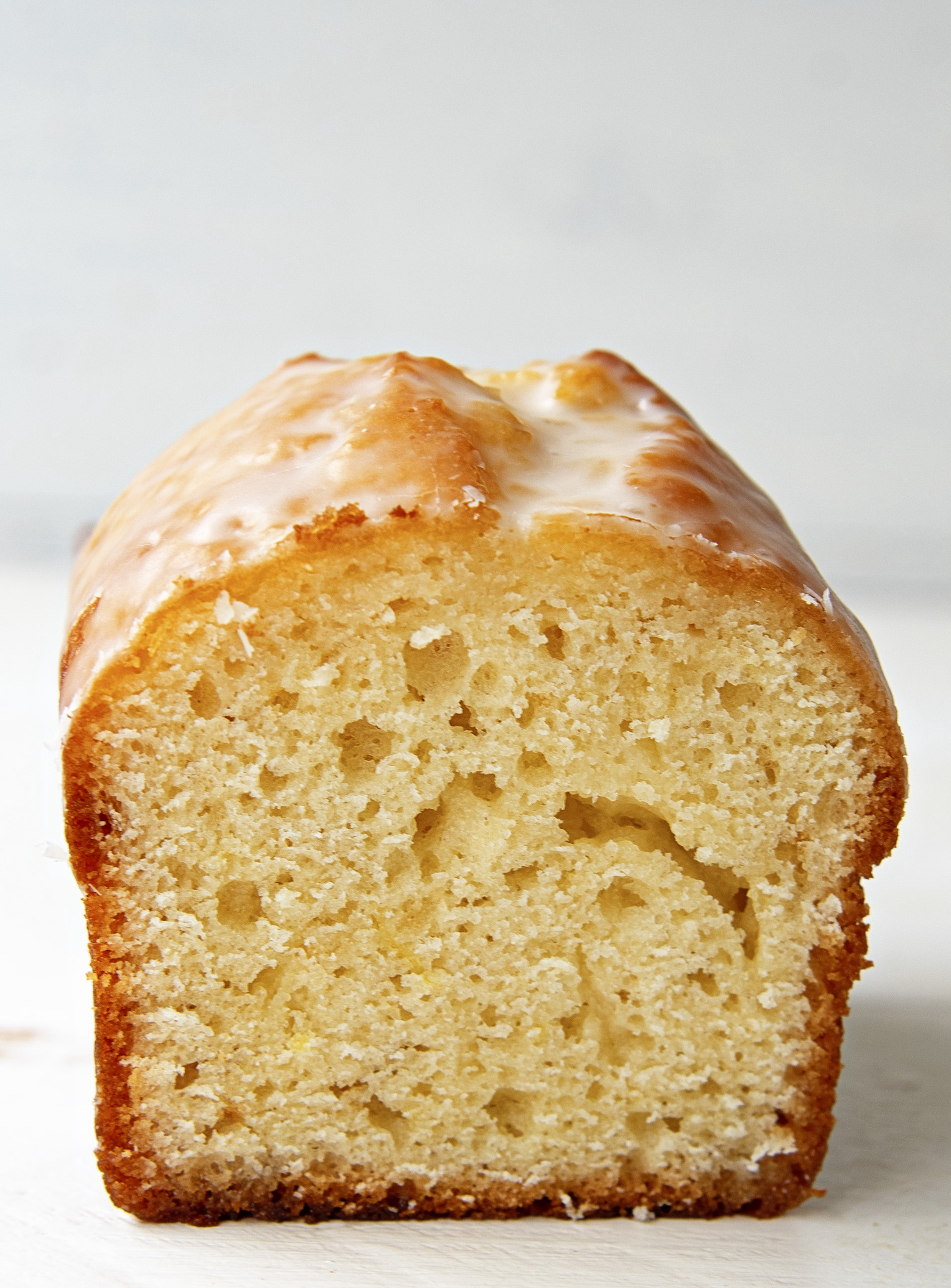 Close up of the Sweet Tea Glazed Lemon Loaf cut open to expose inside. 