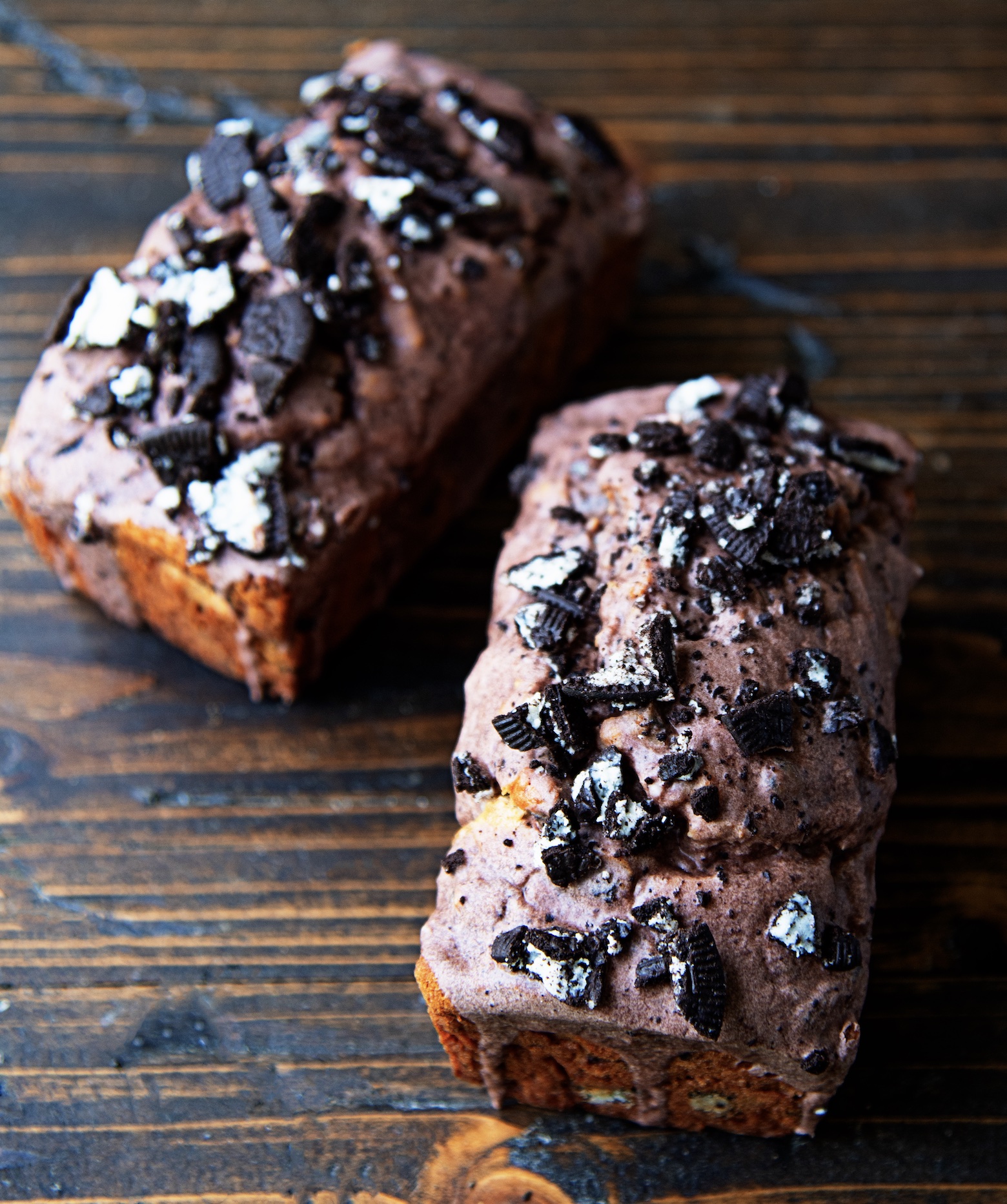 Two whole cookies and cream banana breads side by side.