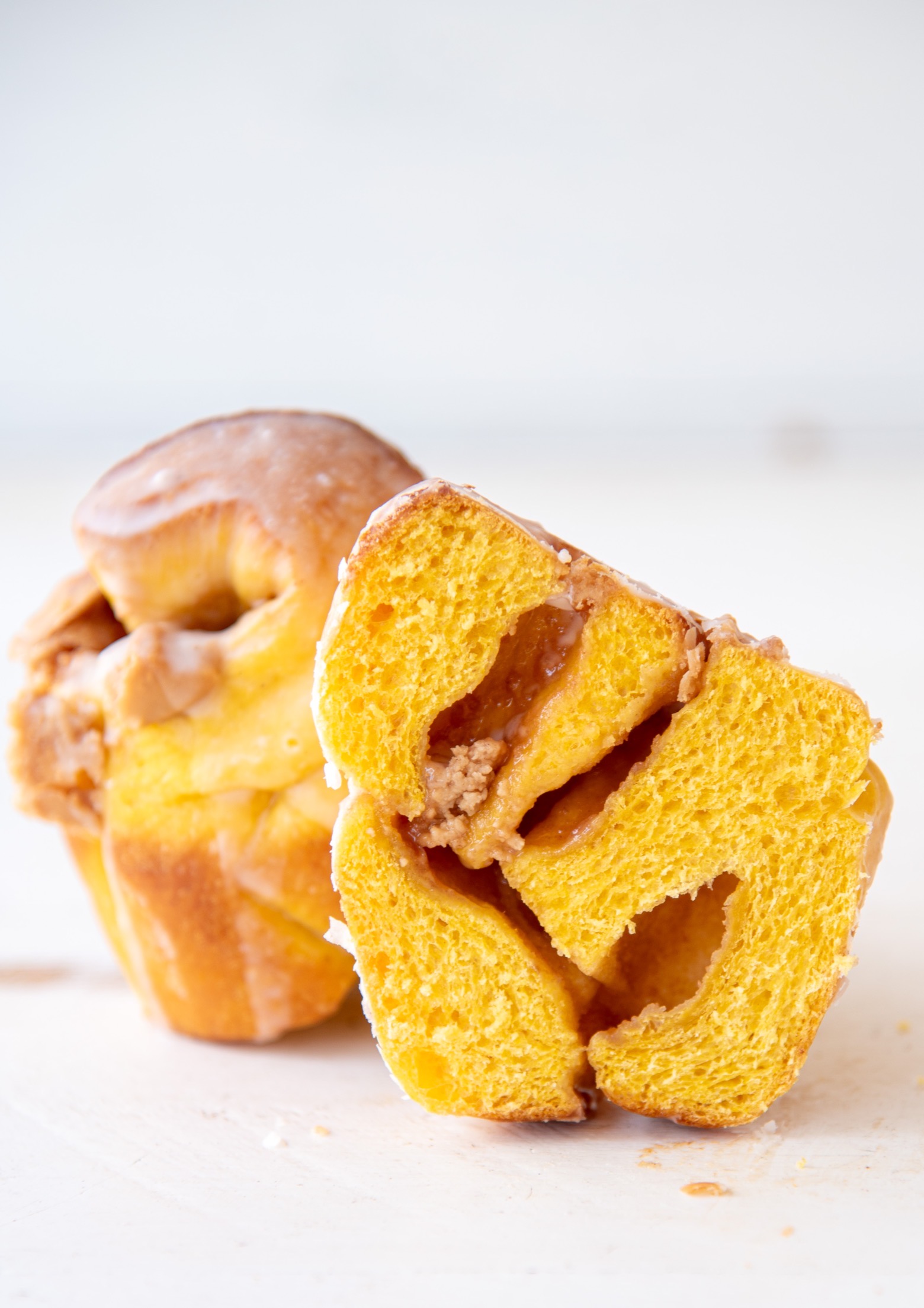 Cross-section of a bun that was cut in half exposing the middle of the bun.